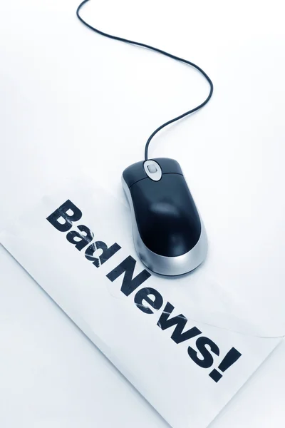 Bad News and computer mouse — Stock Photo, Image