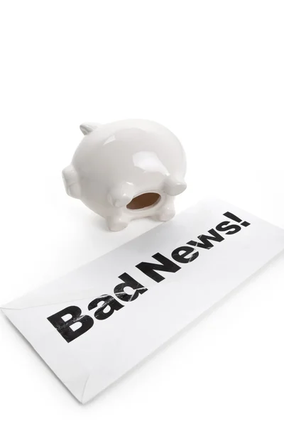 Bad News and Piggy Bank — Stock Photo, Image