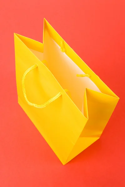 Saco de compras amarelo — Fotografia de Stock