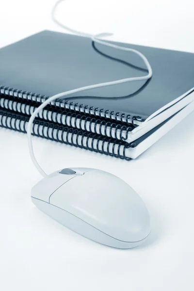 School textbook and computer mouse — Stock Photo, Image