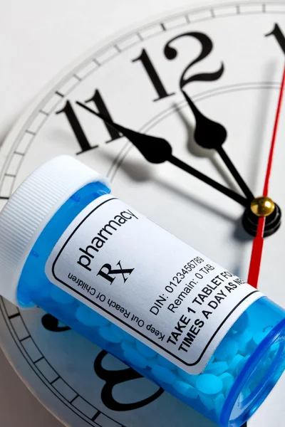 Clock and Pill Bottle — Stock Photo, Image