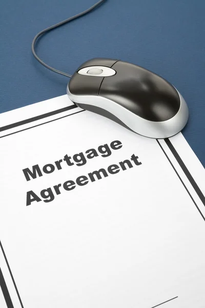 Mortgage Agreement and computer mouse — Stock Photo, Image