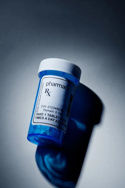 Botella de la píldora azul Imagen de archivo