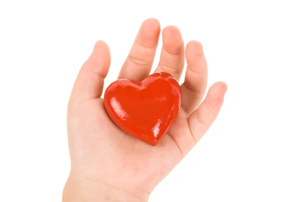 Рука, держащая красное сердце — стоковое фото