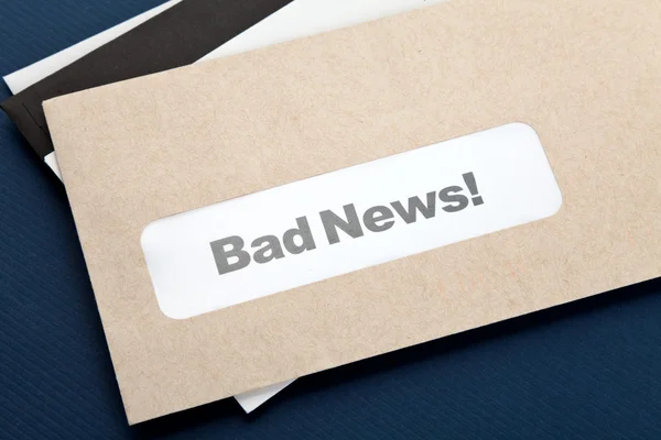Bad News and envelope Stock Image
