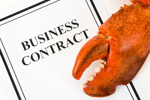 Lobster Claw and Business Contract — Stock Photo, Image