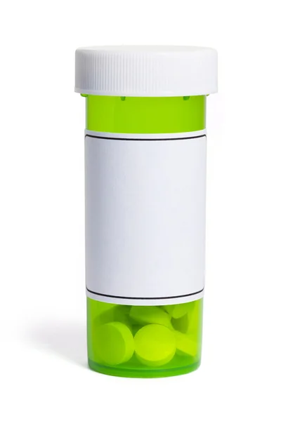Zelenou pilulku láhev — Stock fotografie