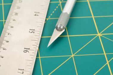 Cutting Mat and Knife clipart