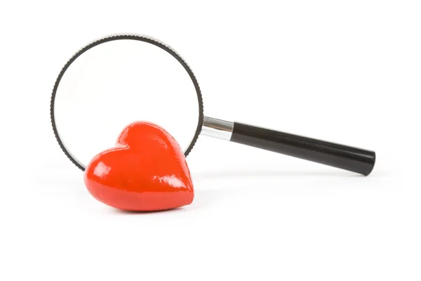 Red Heart and magnifier — Stock Photo, Image