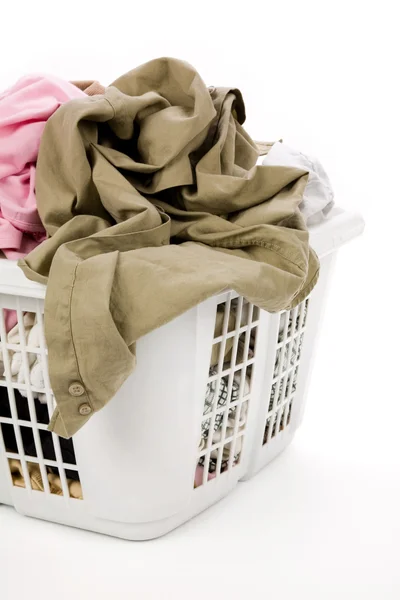 Laundry basket and dirty clothing Royalty Free Stock Images