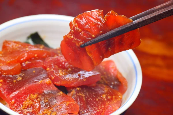 stock image Vinegared rice topped with sliced raw tuna