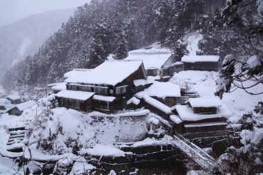 Hot spring resort in snow clipart