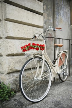 Flowered bike in Italy clipart