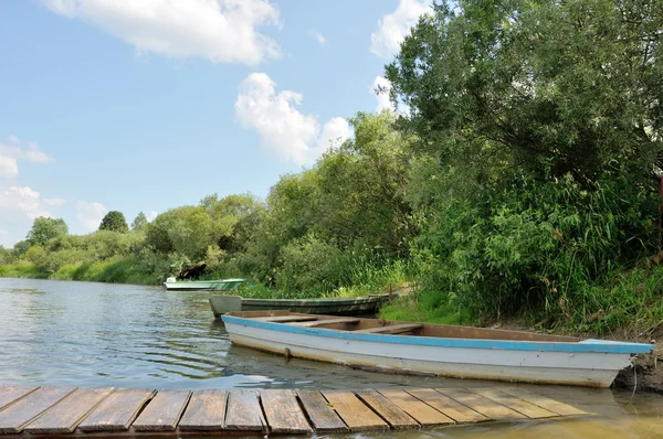 stock image Wooden boat on the river