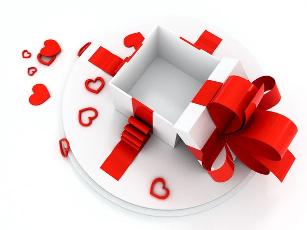 Avoin lahjapakkaus punaisella sydämellä eri muodoissa — kuvapankkivalokuva