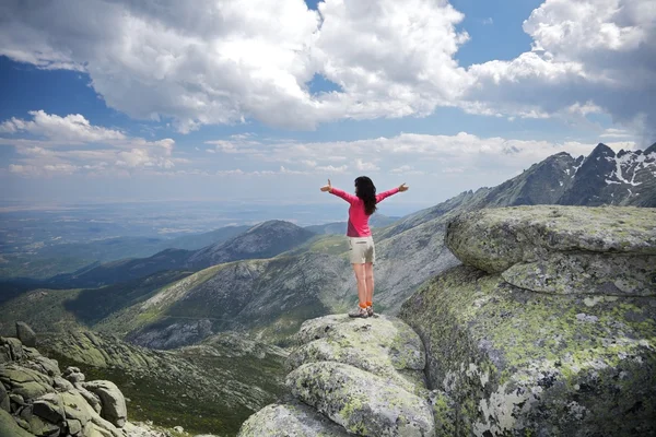 Side embracing woman at the top — Stock Photo, Image