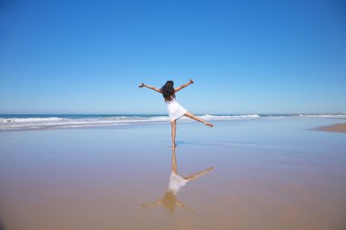 Dancing woman at Castilnovo beach clipart