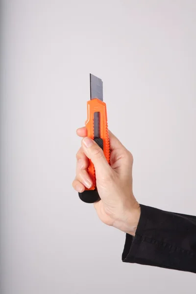 Isolated cutter on hand — Stock Photo, Image