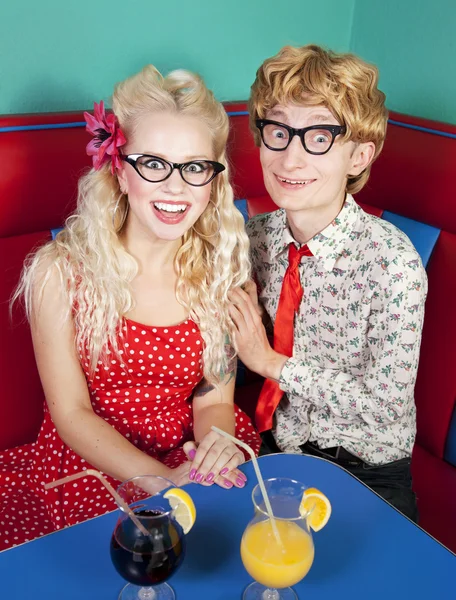 Happy nerdy couple Royalty Free Stock Images