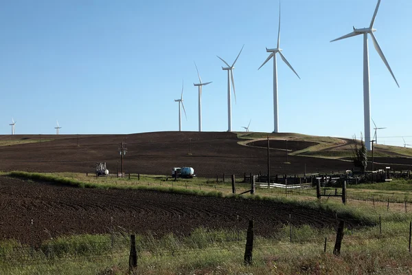 stock image Wind energy turbines and farmland.