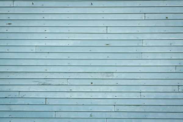 Skiva den blå ytterväggar på gamla hus. — Stockfoto