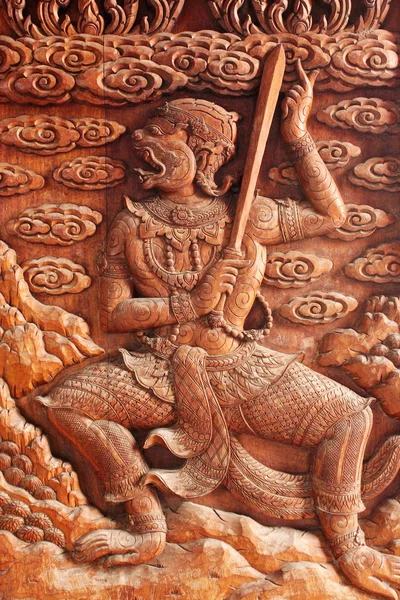 Inheemse Thaise stijl snijwerk, schilderen op kerkdeur in de tempel — Stockfoto