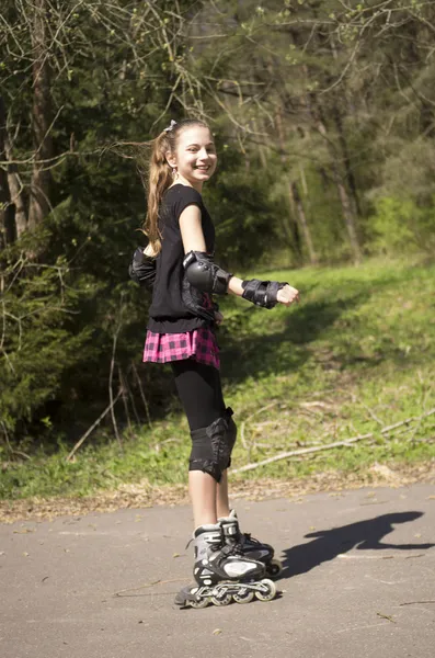 Stock image Young girl skating on Roller Skates outdoor