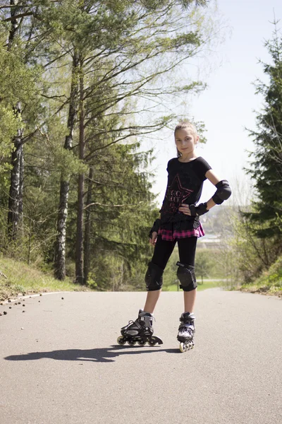 stock image Young girl skating on Roller Skates outdoor