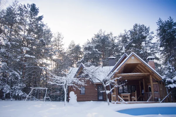 Wooden house in winter — Stock Photo, Image