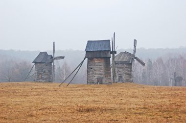 Windmill in fog clipart