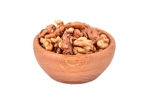 Орех в деревянной чаше — стоковое фото
