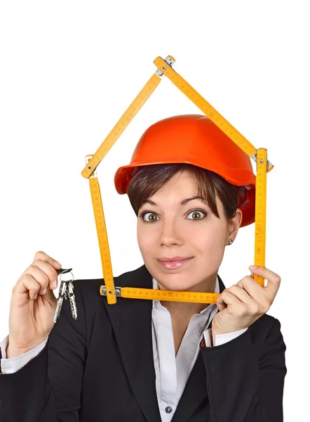Woman architect with key and ruler — Stock Photo, Image