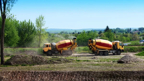 stock image Concrete mixer trucks