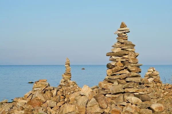 stock image High pyramid from a stone on the bank of Baikal