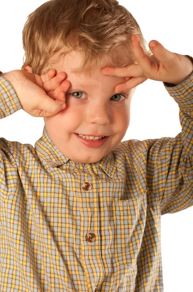 En liten pojke som skrattar — Stockfoto