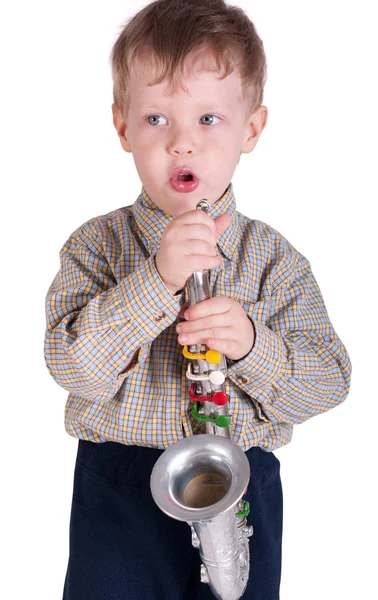 Petit garçon avec un saxophone — Photo