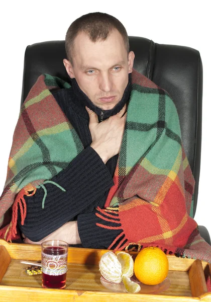Sick man wrapped in a blanket — Stock Photo, Image