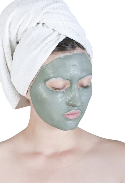 Stock image Woman left a cosmetic clay mask on face