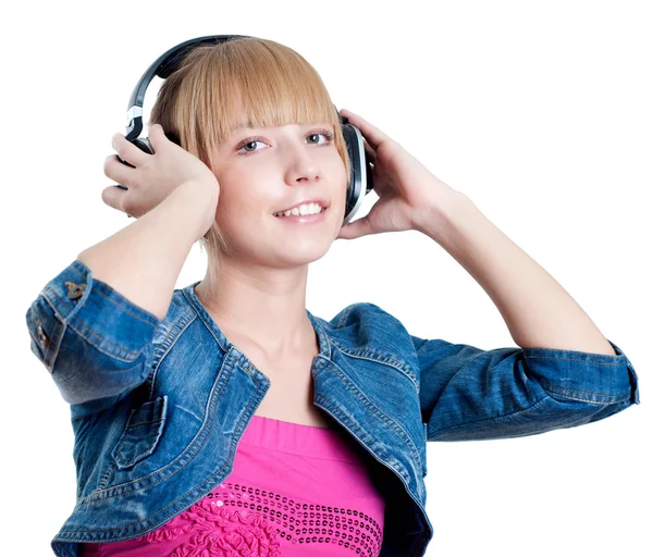 Young attractive woman listing to music — Stock Photo, Image