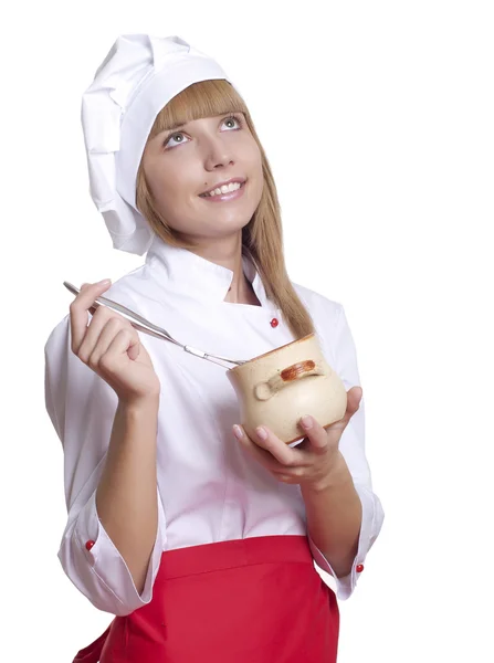 Mulher cozinheiro atraente um fundo sobre branco — Fotografia de Stock