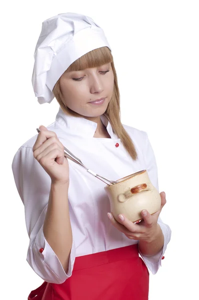 Attrayant cuisinière femme sur fond blanc — Photo