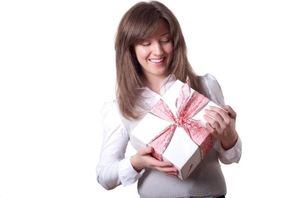 Young smiling woman holding gift Stock Picture
