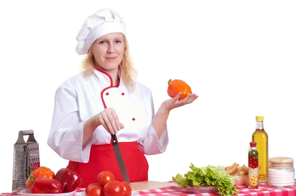 Attractive woman cooks — Stock Photo, Image