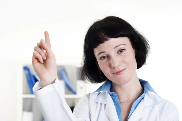 Doctor specifies a finger, focus on the person — Stock Photo, Image