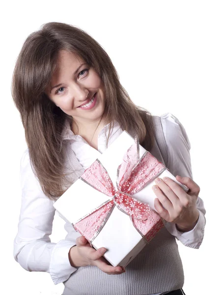 Young smiling woman holding gift — Stock Photo, Image