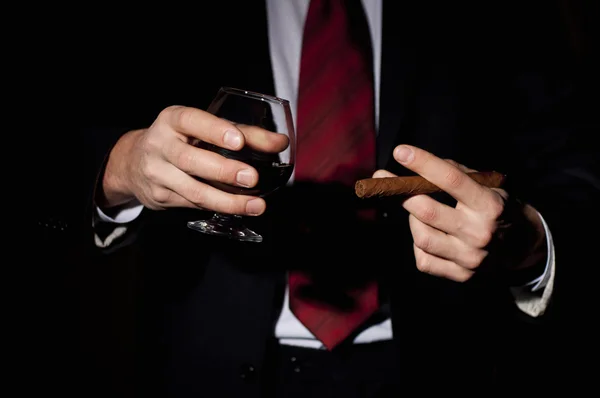 Stock image Rich person, holds a cigar and whisky