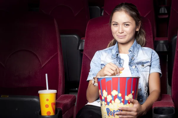 Woman at the cinema — Stock Photo, Image