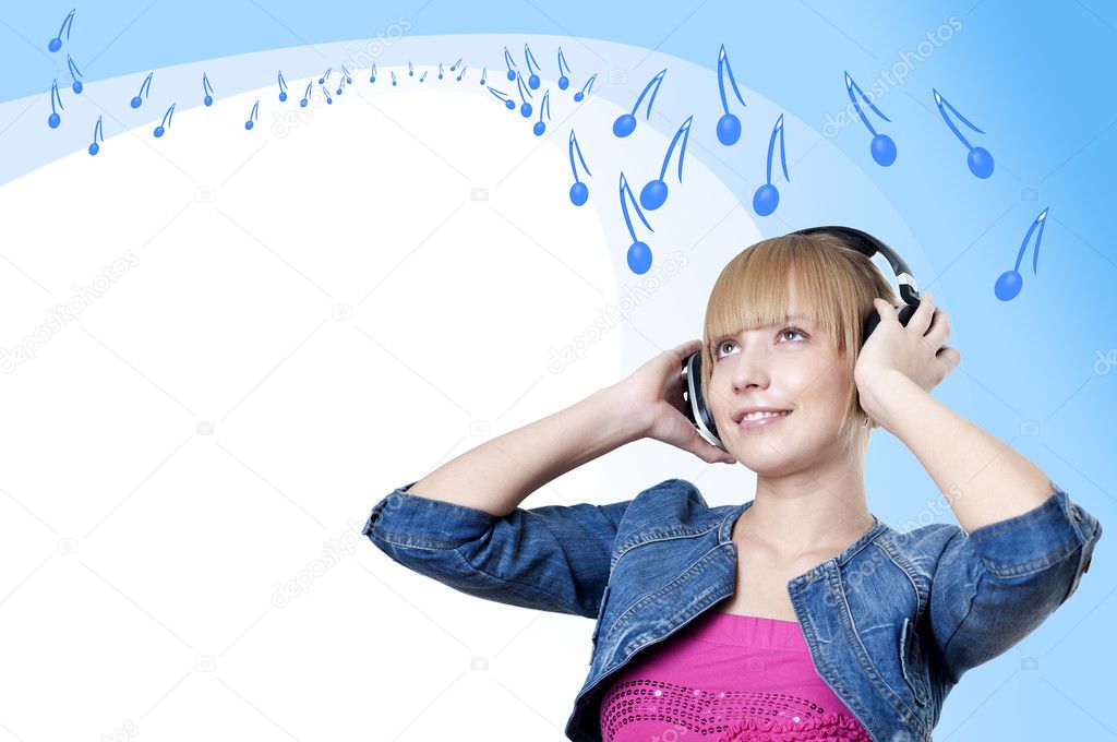 Young attractive woman listing to music