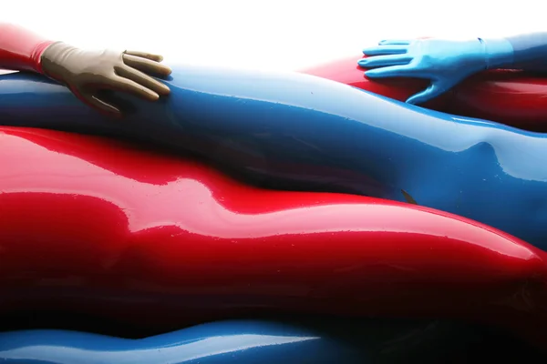 Red and Blue Latex Rubber Catsuit Girls — Stock Photo, Image