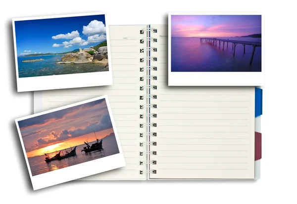 Photo frames on note pad — Stock Photo, Image